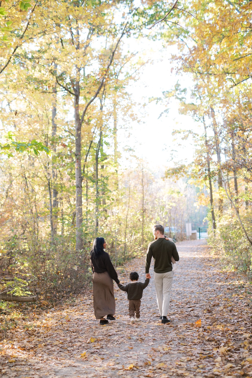 A playful family portrait in the Beamers Falls field