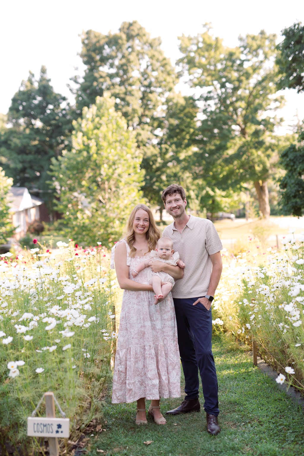 A luminous family moment among the flowers